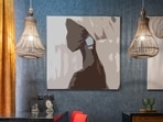 Wall art paintings or prints add vibrancy and a sense of cool into walls (Pexels)