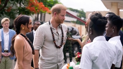 Prince Harry and his wife Meghan Markle visited Nigeria on Friday as part of his promotion of the Invictus Games, the sporting event he founded for wounded military veterans. (AP) Prince Harry and his wife Meghan Markle visited Nigeria on Friday as part of his promotion of the Invictus Games, the sporting event he founded for wounded military veterans. (AP)