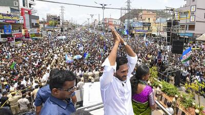 Andhra Pradesh chief minister YS Jagan Mohan Reddy greets supporters during an election rally at Mangalagiri, amid the ongoing Lok Sabha elections in Guntur district on Friday. (PTI) Andhra Pradesh chief minister YS Jagan Mohan Reddy greets supporters during an election rally at Mangalagiri, amid the ongoing Lok Sabha elections in Guntur district on Friday. (PTI)