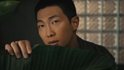BTS RM in a still from the music video of Come Back to Me.