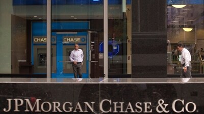 A customer exits the lobby of JPMorgan Chase & Co. headquarters in New York. (Reuters)