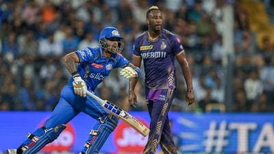 Mumbai Indians' Suryakumar Yadav runs between the wickets as Kolkata Knight Riders' Andre Russell (R) looks on during the Indian Premier League (IPL) Twenty20 cricket match between Mumbai Indians and Kolkata Knight Riders at the Wankhede Stadium in Mumbai on May 3 (AFP) Mumbai Indians' Suryakumar Yadav runs between the wickets as Kolkata Knight Riders' Andre Russell (R) looks on during the Indian Premier League (IPL) Twenty20 cricket match between Mumbai Indians and Kolkata Knight Riders at the Wankhede Stadium in Mumbai on May 3 (AFP)