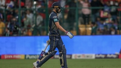 Gujarat Titans' captain Shubman Gill walks off the field after losing his wicket during a match. (AP)