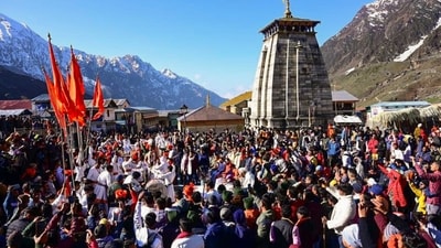 At the time of the opening of the doors of the shrine, flowers were also showered on pilgrims by a helicopter.&nbsp; (PTI)
