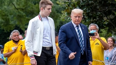 Barron Trump with POTUS (Source: AFP) Barron Trump with POTUS (Source: AFP)