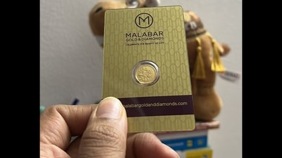 An individual showing a gold coin he ordered from Blinkit on Akshaya Tritiya. (X/@notthatgeek) An individual showing a gold coin he ordered from Blinkit on Akshaya Tritiya. (X/@notthatgeek)