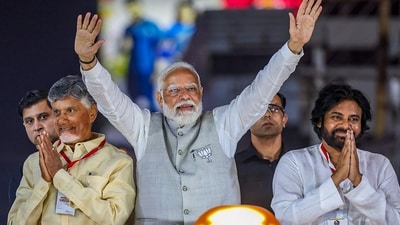 Vijayawada: Prime Minister Narendra Modi with JanaSena party President and actor Pawan Kalyan and Telugu Desam Party (TDP) President N Chandrababu Naidu during an election roadshow for the Lok Sabha elections, in Vijayawada. (PTI) Vijayawada: Prime Minister Narendra Modi with JanaSena party President and actor Pawan Kalyan and Telugu Desam Party (TDP) President N Chandrababu Naidu during an election roadshow for the Lok Sabha elections, in Vijayawada. (PTI)