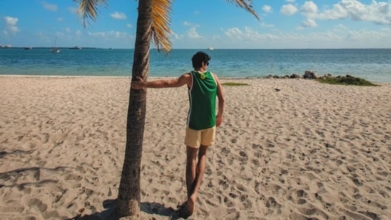 He’s also taking in the beauty of the azure beaches while there clearly.&nbsp;