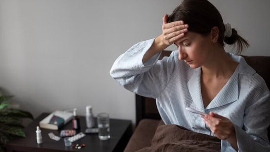 3. Head Throbbing: Get ready for some intense headaches that feel like your brain's doing a drum solo. Ouch!(Photo by Freepik)