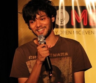 Manaal Patil, 26, is founder of the Blue Material comedy platform. His aim is to capture more stage time, and expand the group, he says. Manaal Patil, 26, is founder of the Blue Material comedy platform. His aim is to capture more stage time, and expand the group, he says.