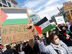 With flags of Palestine in hand, hundreds of people demonstrate at the Hauptwache in Frankfurt/Main, Germany, Saturday, May 15, 2021. (Boris Roessler/dpa via AP) With flags of Palestine in hand, hundreds of people demonstrate at the Hauptwache in Frankfurt/Main, Germany, Saturday, May 15, 2021. (Boris Roessler/dpa via AP)
