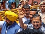 Delhi Chief Minister Arvind Kejriwal with Punjab's Bhagwant Mann visits Hanuman Mandir a day after he got interim bail in a money laundering case, amid Lok Sabha elections, in Delhi's Connaught Place, (PTI)