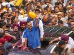 Delhi Chief Minister and AAP convenor Arvind Kejriwal with Punjab Chief Minister Bhagwant Mann during a road show for Lok Sabha elections, at Mehrauli in New Delhi, Saturday, May 11, 2024. (PTI)