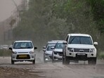 Rain brings the mercury down: commuters heading to their destination during rain on Friday. (Gurpreet Singh/Hindustan Times) Rain brings the mercury down: commuters heading to their destination during rain on Friday. (Gurpreet Singh/Hindustan Times)
