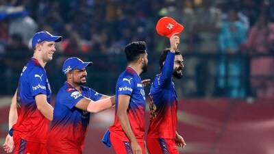 Royal Challengers Bengaluru's Virat Kohli (R) celebrates with teammates after the run out of Punjab Kings' Shashank Singh during an Indian Premier League (IPL) Twenty20 cricket match (AFP) Royal Challengers Bengaluru's Virat Kohli (R) celebrates with teammates after the run out of Punjab Kings' Shashank Singh during an Indian Premier League (IPL) Twenty20 cricket match (AFP)