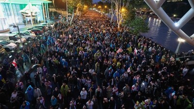 Protesters march during a rally against the controversial "foreign influence" bill in Tbilisi (AFP) Protesters march during a rally against the controversial "foreign influence" bill in Tbilisi (AFP)