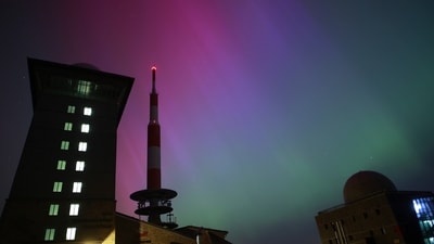 Northern lights appear in the night sky above the Brocken early Saturday, May 11, 2024, in Schierke, northern Germany. (Matthias Bein/dpa via AP) (AP) Northern lights appear in the night sky above the Brocken early Saturday, May 11, 2024, in Schierke, northern Germany. (Matthias Bein/dpa via AP) (AP)