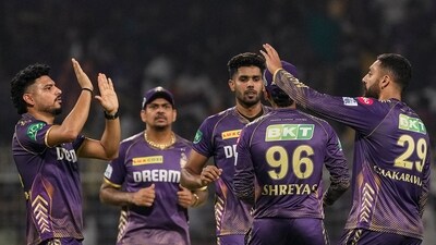 Kolkata Knight Riders' Varun Chakravarthy celebrates with teammates after taking the wicket of Mumbai Indians' Rohit Sharma during an Indian Premier League (IPL) 2024 T20 cricket match between Kolkata Knight Riders and Mumbai Indians (PTI) Kolkata Knight Riders' Varun Chakravarthy celebrates with teammates after taking the wicket of Mumbai Indians' Rohit Sharma during an Indian Premier League (IPL) 2024 T20 cricket match between Kolkata Knight Riders and Mumbai Indians (PTI)