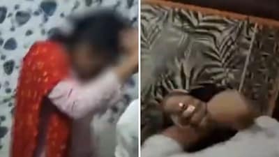The image shows a UP doctor beating up his wife and two men after allegedly finding them in a compromising position in a hotel. (Screengrab) The image shows a UP doctor beating up his wife and two men after allegedly finding them in a compromising position in a hotel. (Screengrab)
