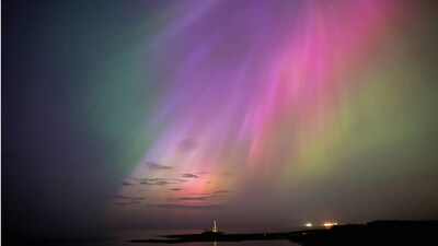 St. Mary's Lighthouse at Whitley Bay on the North East coast of England: The aurora borealis, often known as the northern lights, lingers over the horizon on Friday, May 10, 2024. ((Owen Humphreys/PA via AP)) St. Mary's Lighthouse at Whitley Bay on the North East coast of England: The aurora borealis, often known as the northern lights, lingers over the horizon on Friday, May 10, 2024. ((Owen Humphreys/PA via AP))