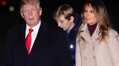 US president Donald Trump, First Lady Melania Trump and son Barron at the White House in Washington, DC on January 1, 2018. (AFP Photo) US president Donald Trump, First Lady Melania Trump and son Barron at the White House in Washington, DC on January 1, 2018. (AFP Photo)