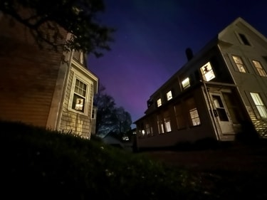 The northern lights shine over Portsmouth, N.H., Friday, May 10, 2024. (AP Photo/Caleb Jones) (AP) The northern lights shine over Portsmouth, N.H., Friday, May 10, 2024. (AP Photo/Caleb Jones) (AP)