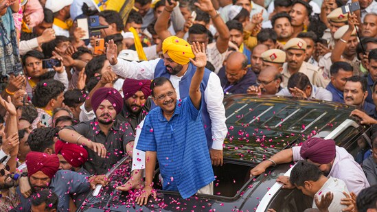 Delhi Chief Minister and AAP convenor Arvind Kejriwal with Punjab Chief Minister Bhagwant Mann during a road show for Lok Sabha elections, at Mehrauli in New Delhi, Saturday, May 11, 2024.