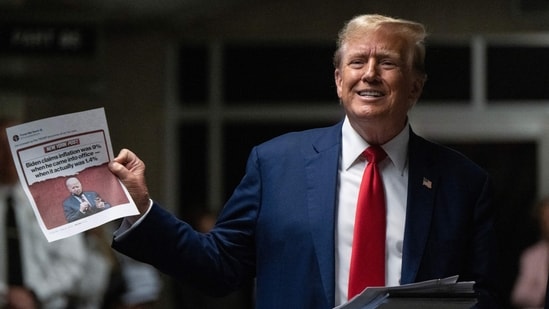 Former US President Donald Trump speaks to the press before leaving for the day at his trial for allegedly covering up hush money payments linked to extramarital affairs, at Manhattan Criminal Court in New York City, (Photo by Victor J. Blue / POOL / AFP) (AFP)