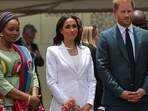Britain's Prince Harry, Duke of Sussex and his wife Meghan, Duchess of Sussex watch traditional performers as they perform on their arrival, at the Nigerian army headquarters in Abuja, Nigeria May 10, 2024.REUTERS/Akintunde Akinleye