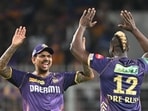 Kolkata Knight Riders' Andre Russell (R) celebrates with teammate Sunil Narine after taking a wicket. Kolkata Knight Riders' Andre Russell (R) celebrates with teammate Sunil Narine after taking a wicket.