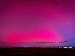 People in Kansas, Nebraska, Iowa, Michigan, Minnesota and other Midwestern states were able to capture photos of bright colours along the horizon.(AFP)