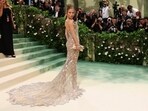 Jennifer Lopez pushes forward with tour amidst ticket sale concerns.