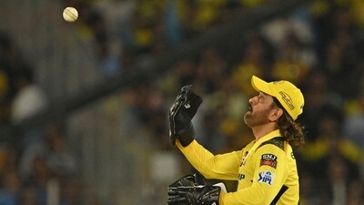 Chennai Super Kings' MS Dhoni throws the ball as he fields during the Indian Premier League (IPL) Twenty20 cricket match between Gujarat Titans and Chennai Super Kings (AFP) Chennai Super Kings' MS Dhoni throws the ball as he fields during the Indian Premier League (IPL) Twenty20 cricket match between Gujarat Titans and Chennai Super Kings (AFP)
