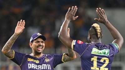 Kolkata Knight Riders' Andre Russell (R) celebrates with teammate Sunil Narine after taking a wicket. (AFP) Kolkata Knight Riders' Andre Russell (R) celebrates with teammate Sunil Narine after taking a wicket. (AFP)