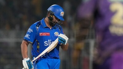 Rohit Sharma walks off the field after losing his wicket during the Indian Premier League cricket match between Kolkata Knight Riders and Mumbai Indians (AP) Rohit Sharma walks off the field after losing his wicket during the Indian Premier League cricket match between Kolkata Knight Riders and Mumbai Indians (AP)