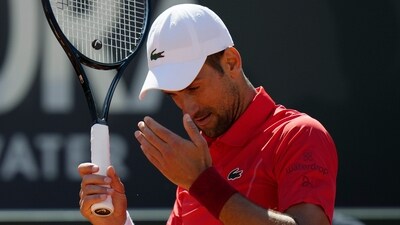 Serbia's Novak Djokovic reacts during a match against Chile's Alejandro Tabilo at the Italian Open tennis tournament in Rome, Sunday, May 12 (AP) Serbia's Novak Djokovic reacts during a match against Chile's Alejandro Tabilo at the Italian Open tennis tournament in Rome, Sunday, May 12 (AP)