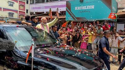 Prime Minister Narendra Modi during a roadshow in West Bengal’s North 24 Parganas on Sunday. (ANI) Prime Minister Narendra Modi during a roadshow in West Bengal’s North 24 Parganas on Sunday. (ANI)