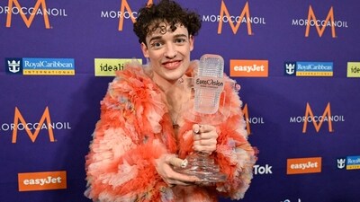 Nemo holds their trophy after the final of the 68th edition of the Eurovision Song Contest (ESC). (AFP) Nemo holds their trophy after the final of the 68th edition of the Eurovision Song Contest (ESC). (AFP)