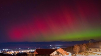 he Aurora Australis, also known as the Southern Lights, glow on the horizon as seen from Ushuaia, Tierra del Fuego, Argentina on May 10, 2024. (Photo by Alexis DELELISI / AFP) (AFP)