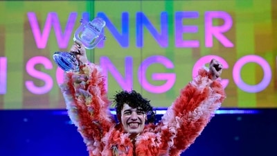 Swiss singer Nemo representing Switzerland with the song The Code celebrates after winning the final of the 68th Eurovision Song Contest (ESC) 2024. (AFP) Swiss singer Nemo representing Switzerland with the song The Code celebrates after winning the final of the 68th Eurovision Song Contest (ESC) 2024. (AFP)