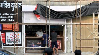 The liquor shop has opened across the road from Delhi Public School in Sector 122, Noida, prompting various residents’ objection. (Sunil Ghosh/HT Photo)