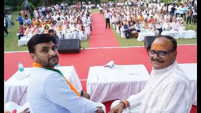 Uttar Pradesh dy CM Brajesh Pathak (right) and senior BJP leader Neeraj Singh campaigning for Rajnath Singh in Lucknow. (Sourced)