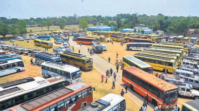 Vehicles on election duty parked at the Birsa College Stadium on the eve of the fourth phase of Lok Sabha elections, in Khunti. (PTI)