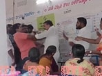 YRSCP leader VS Shivakumar and a voter were seen slapping each other at a polling booth.(Photo - PTI) YRSCP leader VS Shivakumar and a voter were seen slapping each other at a polling booth.(Photo - PTI)