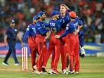 Royal Challengers Bengaluru's Cameron Green (3r) celebrates with teammates during the Indian Premier League (IPL) Twenty20 cricket match between Royal Challengers Bengaluru and Delhi Capitals Royal Challengers Bengaluru's Cameron Green (3r) celebrates with teammates during the Indian Premier League (IPL) Twenty20 cricket match between Royal Challengers Bengaluru and Delhi Capitals