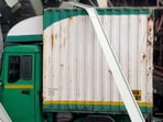 A goods transport vehicle was trapped under the collapsed billboard in Pantnagar, Ghatkopar. HT Photo A goods transport vehicle was trapped under the collapsed billboard in Pantnagar, Ghatkopar. HT Photo