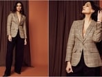 Sonam Kapoor is an absolute fashionista who nails style goals like a pro. Whether it's a chic pantsuit or a red carpet-worthy gown, the diva can pull off any look to perfection. This time around, she takes power dressing to a whole new level by wearing a plaid blazer with black trousers. The stylish diva is quite active on social media and her glam Insta-diaries filled with stunning looks are a treasure trove of style inspiration for all her followers. Her latest look oozing chic vibes is no exception and is sure to steal your heart.