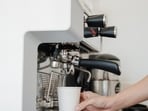 The woman was caught on camera adding bleach to her husband's coffee. 