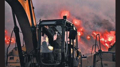 A fire at the Ghazipur landfill site in late April. (PTI) A fire at the Ghazipur landfill site in late April. (PTI)