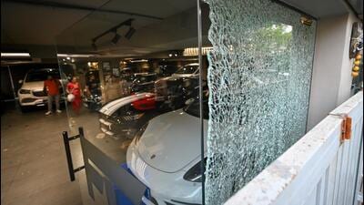 A view of the car showroom after the firing incident. (HT File Photo) A view of the car showroom after the firing incident. (HT File Photo)